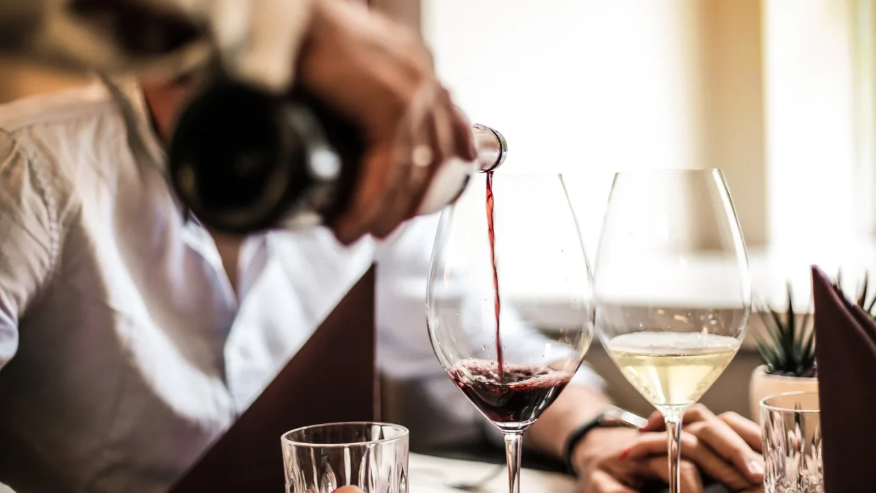 Wine being poured at the table